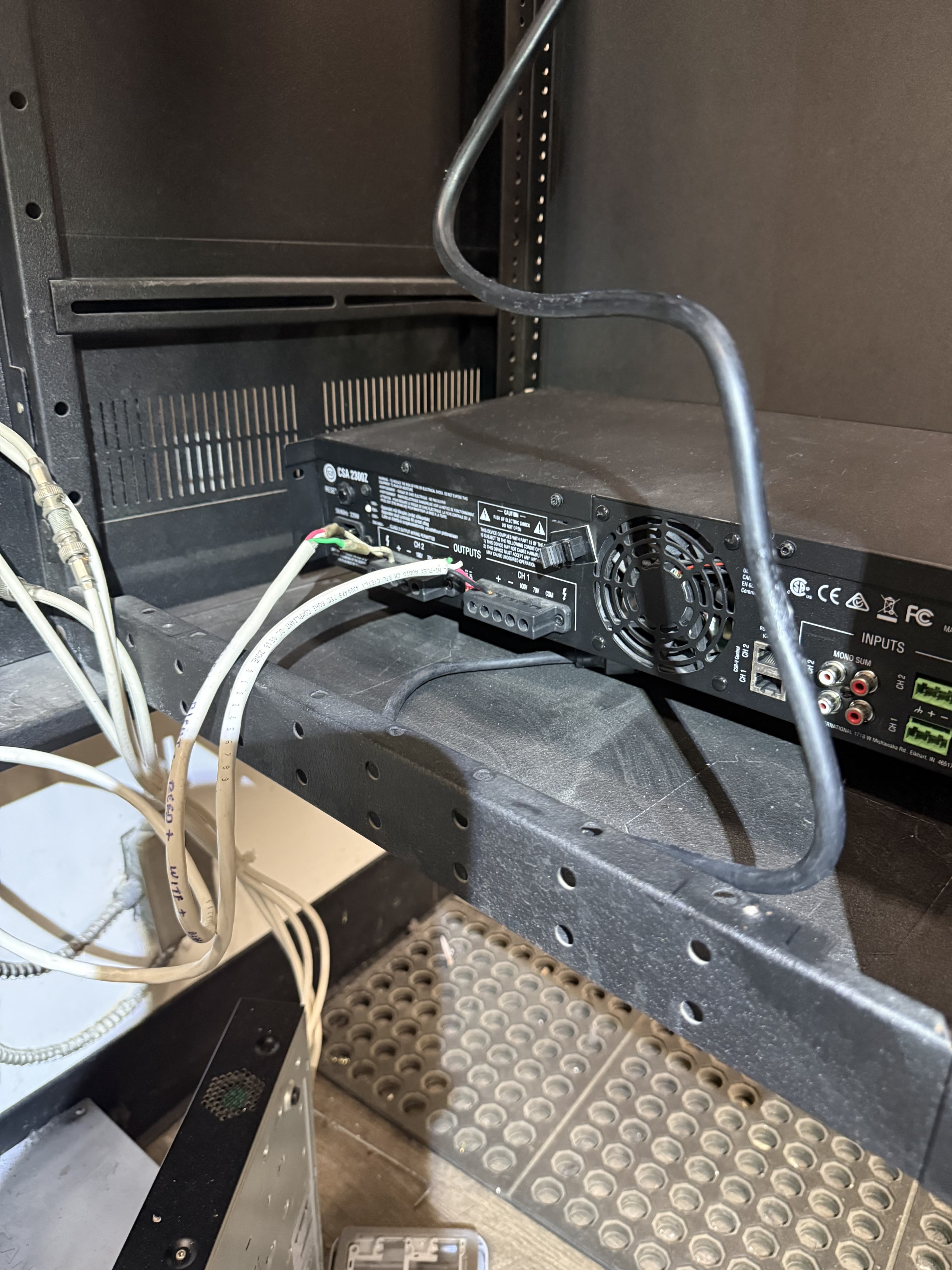 R-AVL technician servicing commercial audio